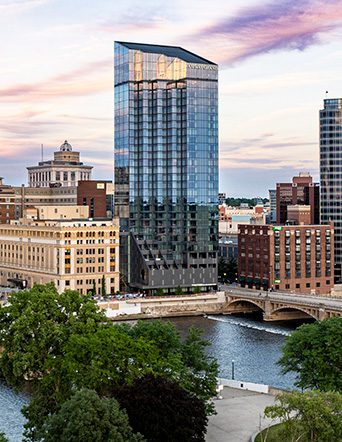 Amway Grand Plaza Hotel is a tall building towering above downtown