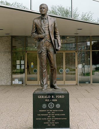 statue in front of museum