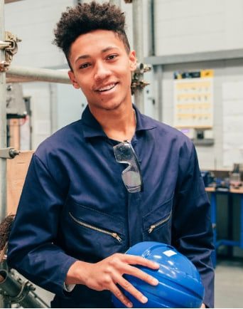 Student intern holding a construction hard hat