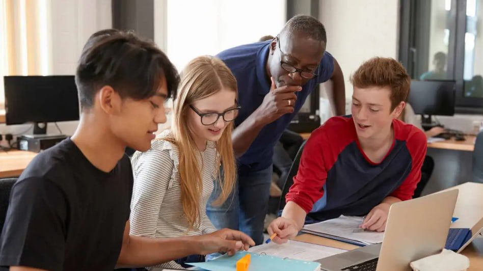Students working on a group project in the classroom