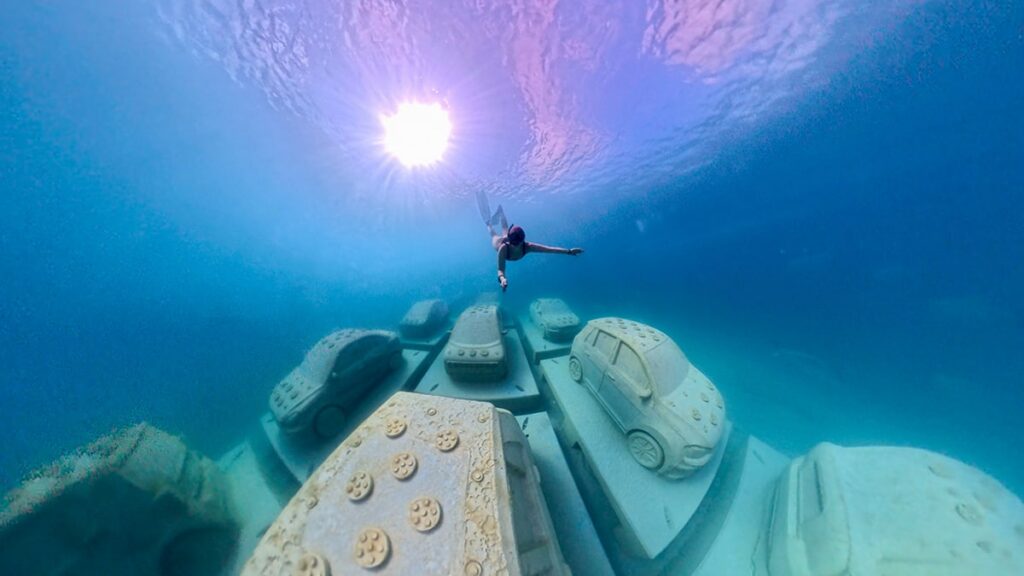 Snorkler swimming around the REEFLINE underwater concrete sculpture installation